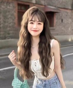 Premium Long Synthetic Wig for Dolls – Variety of Styles, Ideal for Customizing Your Doll’s Look product image showing body appearance and material texture