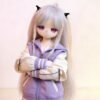 DD065-85 Luna 85cm TPE anime doll, close-up of her face with purple eyes and crossed arms in a jacket.