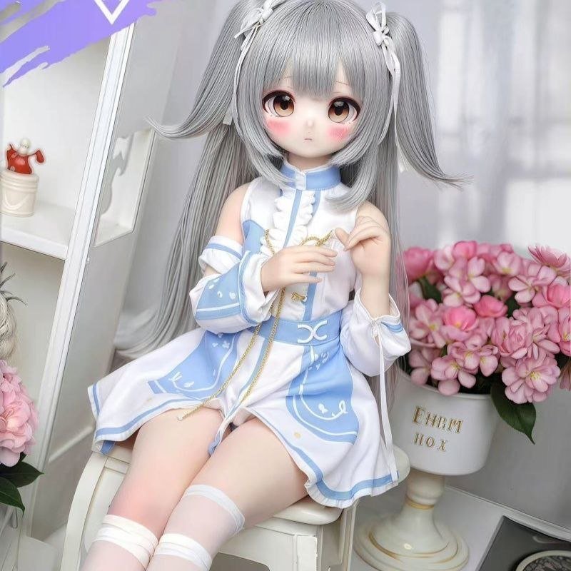 DD066 Seraphina 68cm TPE anime doll full body seated pose showcasing her charming outfit and youthful appearance Seraphina - 68cm Mini Anime Full-Body TPE Figure with Articulated Skeleton, TPE Body PVC Head, SKU: DD066 product image showing body appearance and material texture