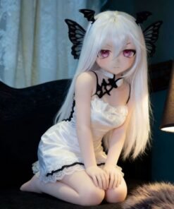 DD068 Luna 68cm TPE anime doll, kneeling pose on a dark couch, highlighting her graceful form and white satin dress.