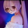 DD069 Miyuki 85cm TPE anime doll, showing her shoulder and the delicate white ruffled top with pink choker.