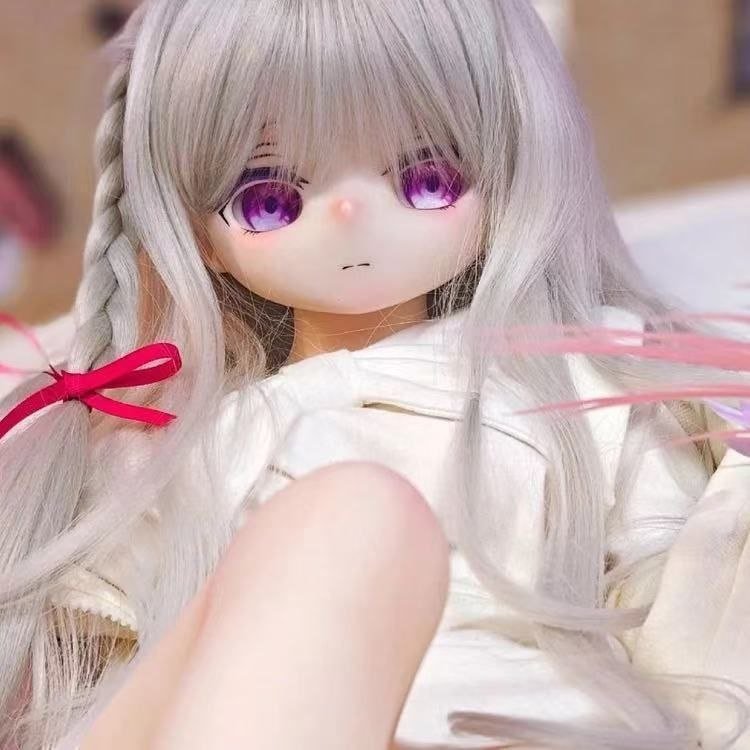 DD07085 Luna 68cm TPE anime doll closeup on face showing purple eyes and silver hair with a braid Luna - 68cm Mini Anime TPE Doll with Articulated Skeleton, PVC Head, SKU: DD070 product image showing body appearance and material texture