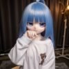 DD072 Luna 85cm TPE anime doll, close-up of her face and hand gesture, highlighting delicate features.