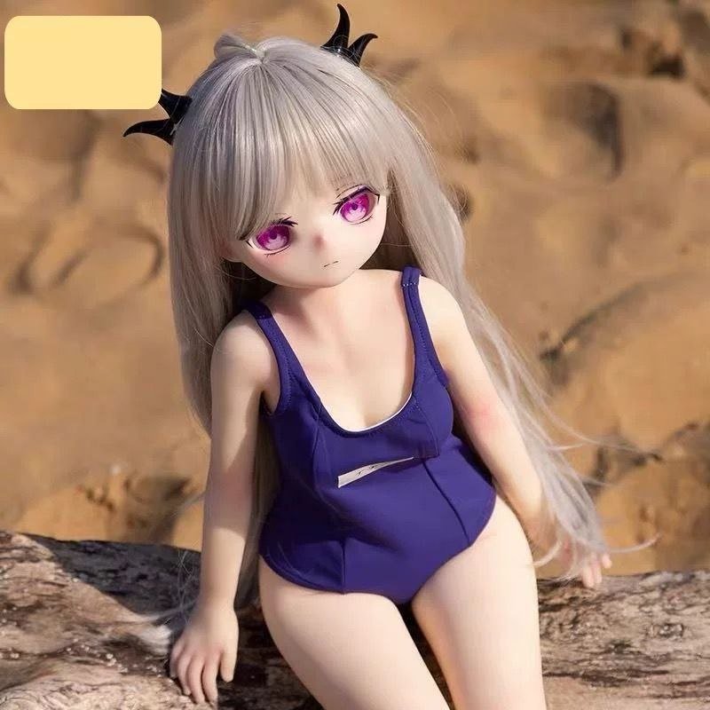 DD073 Luna 68cm TPE anime doll in a purple swimsuit showing her full body and petite figure Luna - 68cm Mini Anime Full-Body TPE Figure with Articulated Skeleton, TPE Body PVC Head, SKU: DD073 product image showing body appearance and material texture