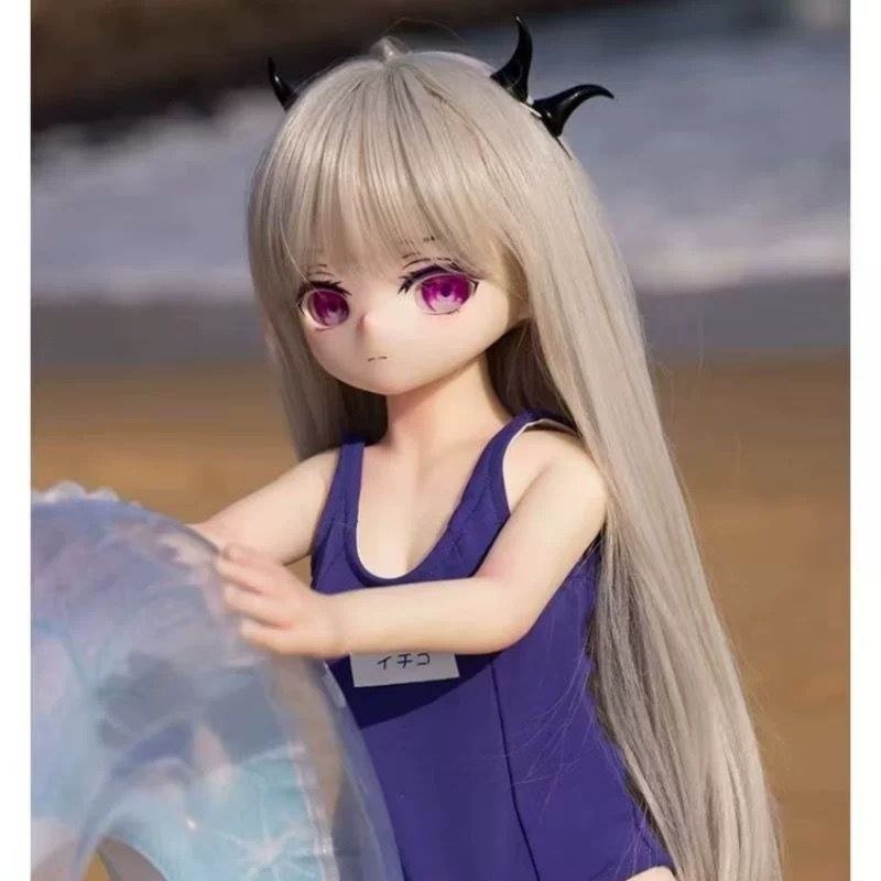 DD073 Luna 68cm TPE anime doll holding an inflatable ring showcasing her playful pose Luna - 68cm Mini Anime Full-Body TPE Figure with Articulated Skeleton, TPE Body PVC Head, SKU: DD073 product image showing body appearance and material texture