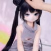 DD103 Mei 68cm TPE anime doll lying down in a grey sweater, hands clasped.