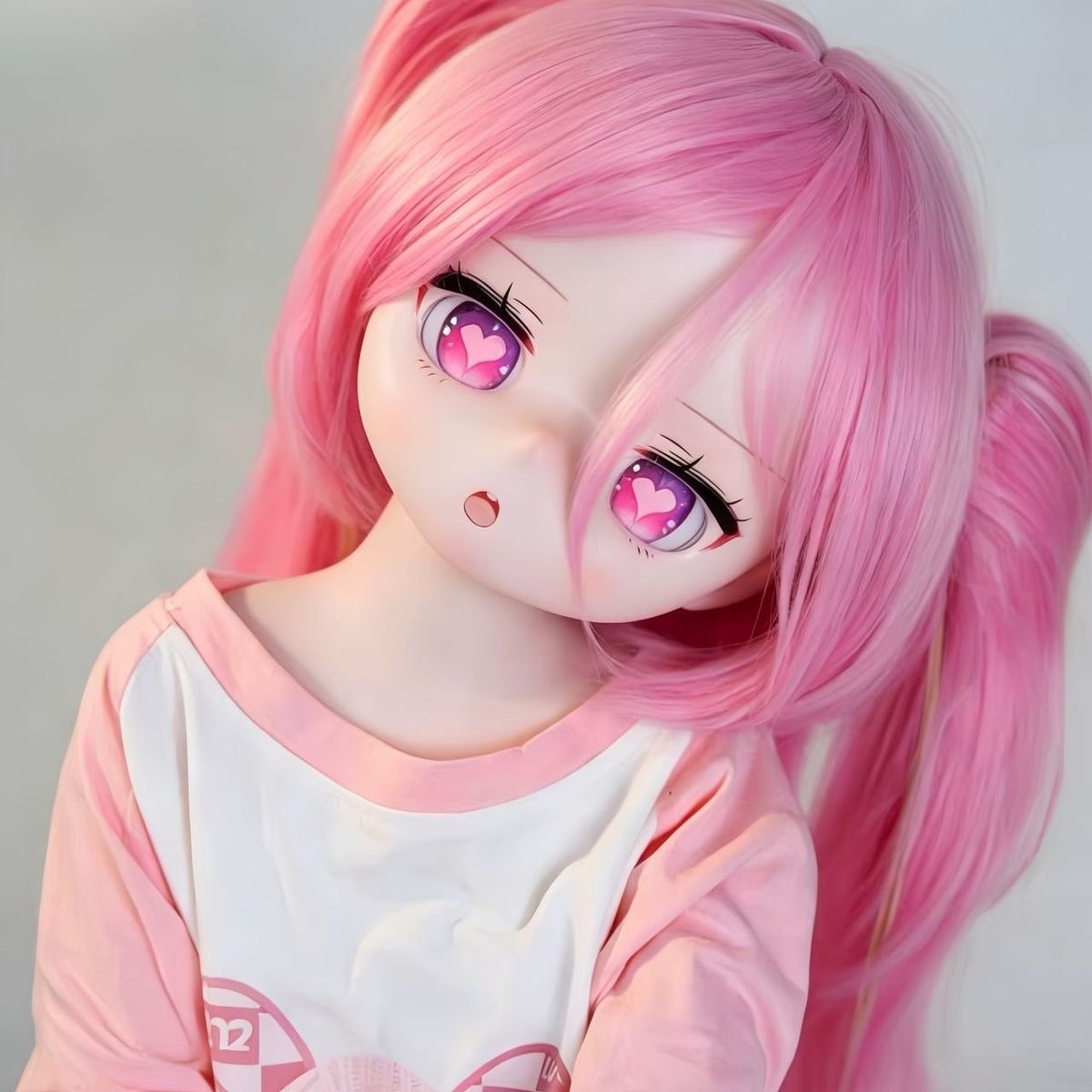 DD106 Luna 68cm TPE anime doll closeup featuring captivating heartshaped eyes and vibrant pink wig Dd106 Luna Anime Tpe Doll with Articulated Skeleton 68cm Dd106 Luna 68cm Tpe Anime Doll Close up Featuring Captivating Heart shaped Eyes and Vibrant Pink Wig Dd106 Dd106 luna anime doll close up heart eyes pink wig