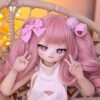 DD107 Lila 68cm TPE anime doll front view showing playful pose with pink wig and white dress DD107 Lila - Anime TPE Figure with Articulated Skeleton, TPE Body PVC Head 68cm product image showing body appearance and material texture