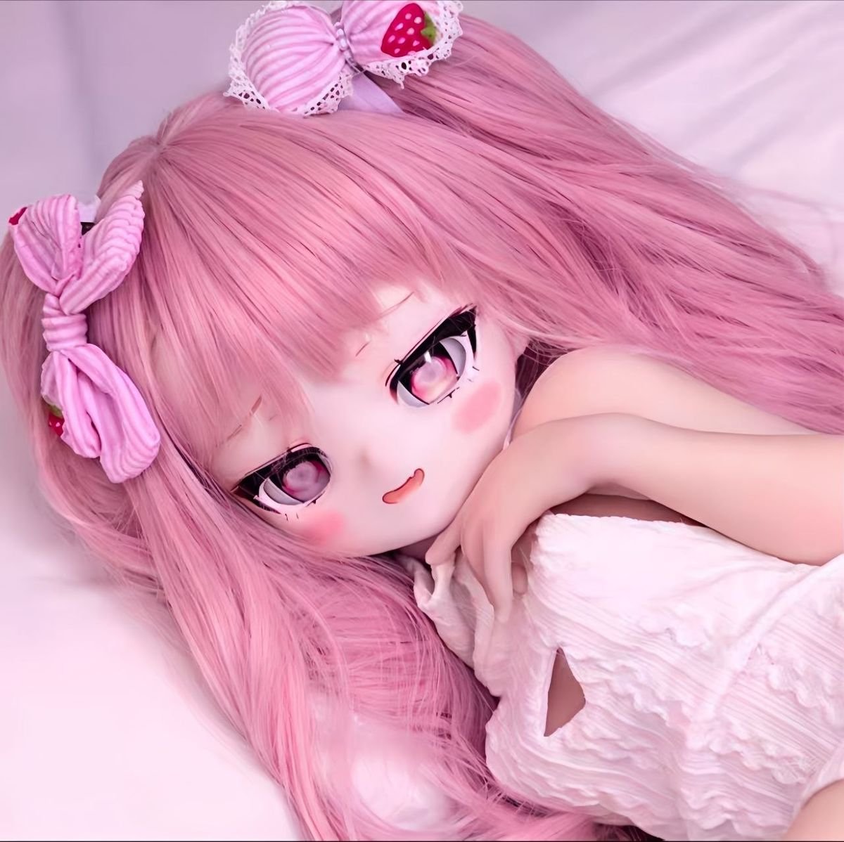 DD107 Lila 68cm TPE anime doll side profile in a relaxed pose highlighting her delicate features and pink hair Dd107 Lila Anime Tpe Figure with Articulated Skeleton Tpe Body Pvc Head 68cm Dd107 Lila 68cm Tpe Anime Doll Side Profile in a Relaxed Pose Highlighting Her Delicate Features and Pink Hair Dd107 Dd107 lila anime doll side profile lying pose