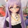 DD108 Luna 68cm TPE anime doll, close-up of her face featuring large blue eyes, round glasses, and a cute bell collar.