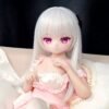 DD109 Seraphina 68cm TPE anime doll seated pose in a pink outfit showcasing her delicate features and long silver hair DD109 Seraphina - TPE Anime Doll with Articulated Skeleton 68cm product image showing body appearance and material texture