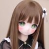 DD112 Miyuki 68cm TPE anime doll, detailed close-up of her expressive face with large green eyes and rosy cheeks.