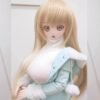 DD120 Luna 168cm TPE realistic doll, upper body portrait showcasing her face and the details of her mint blue outfit.