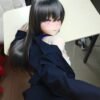 DD124 Aiko 168cm TPE doll, back view showing long dark hair and elegant body lines in a relaxed pose.