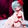 DD125 Lyra 68cm TPE anime doll seated, displaying her charming features and red outfit.
